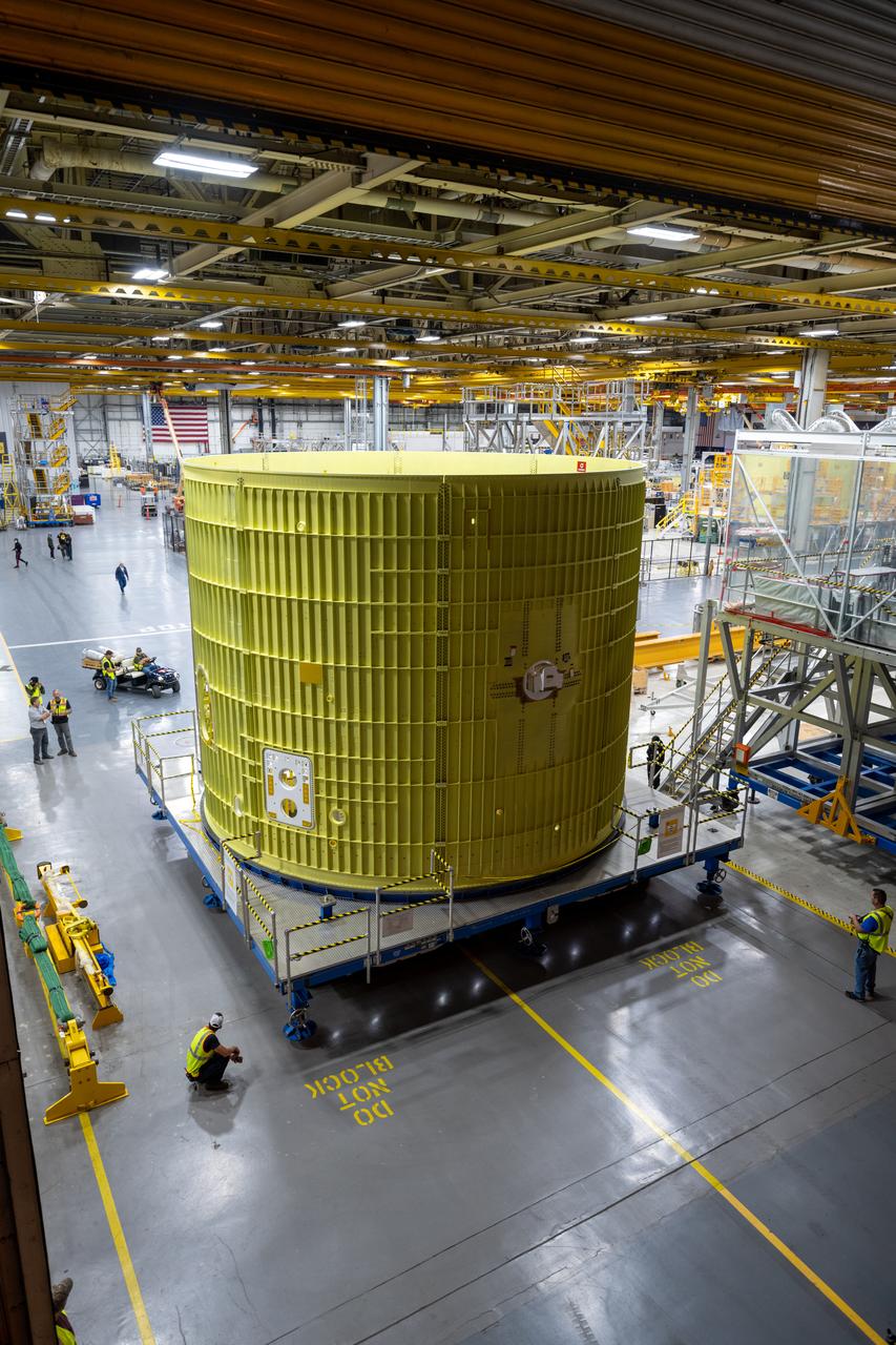 Technicians at NASA’s Michoud Assembly Facility move the intertank of NASA’s Space Launch System rocket for Artemis III to Cell G to await application of the thermal protection system. Thermal protection systems protect space vehicles from aerodynamic heating during entry to planet atmosphere and re-entry to earth atmosphere.  The intertank lays between the liquid hydrogen tank and liquid oxygen tank. Together with the engine section and the forward skirt, they comprise the SLS core stage. The liquid hydrogen tank and liquid oxygen tank hold 733,000 gallons of propellant to power the stage’s four RS-25 engines needed for liftoff and Artemis missions to the Moon and future missions to Mars.